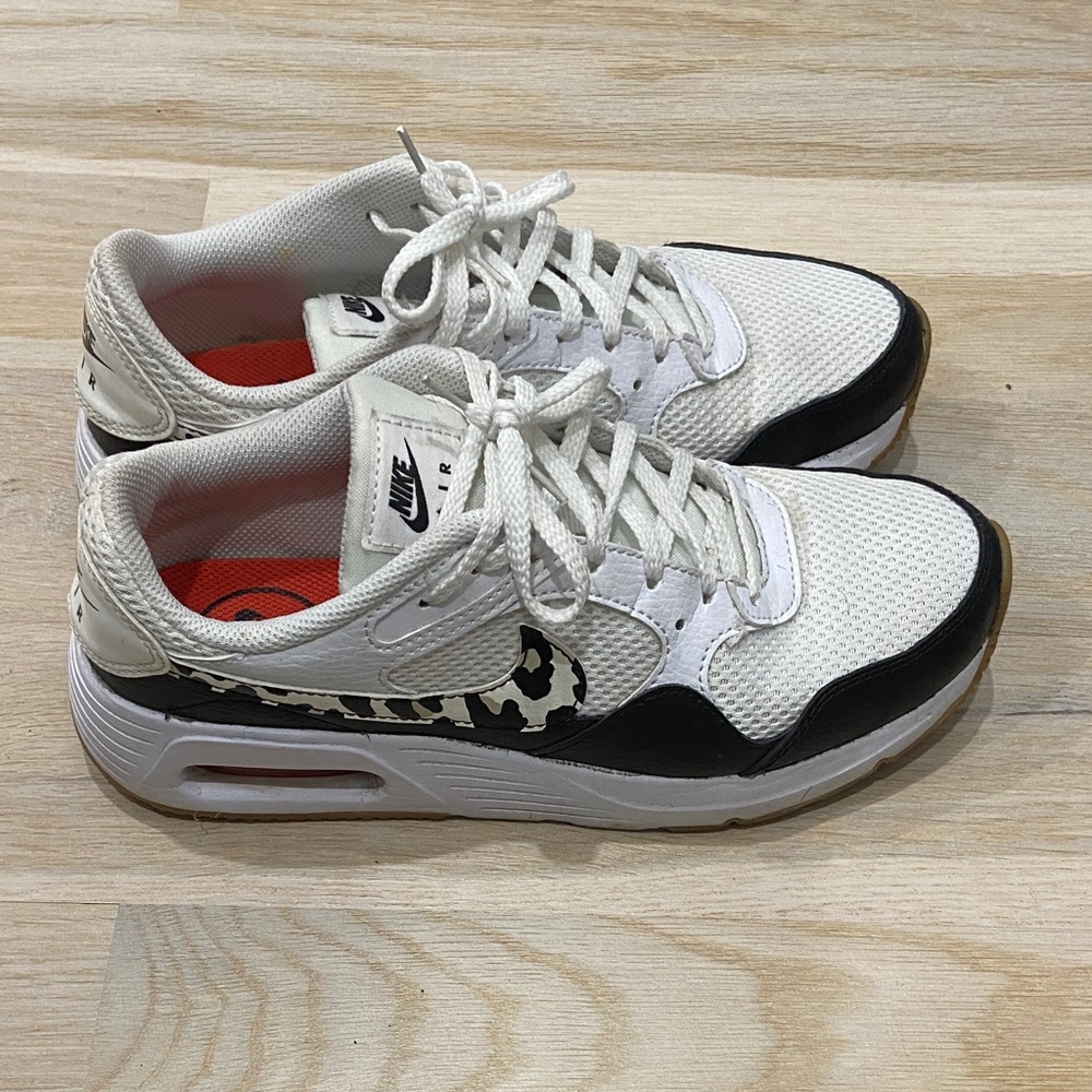 Nike Women’s White & Black Sneakers with Leopard Swoosh size 7.5